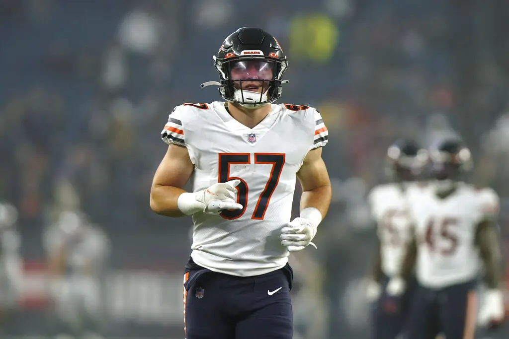 Chicago Bears linebacker Jack Sanborn (57) sacks Detroit Lions quarterback  Jared Goff (16) during the second half of an NFL football game, Sunday, Nov.  13, 2022 in Chicago. The Lions won 31-30. (